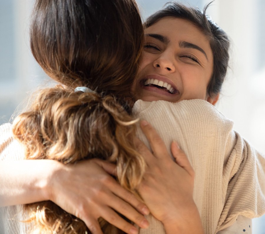 Two people hugging