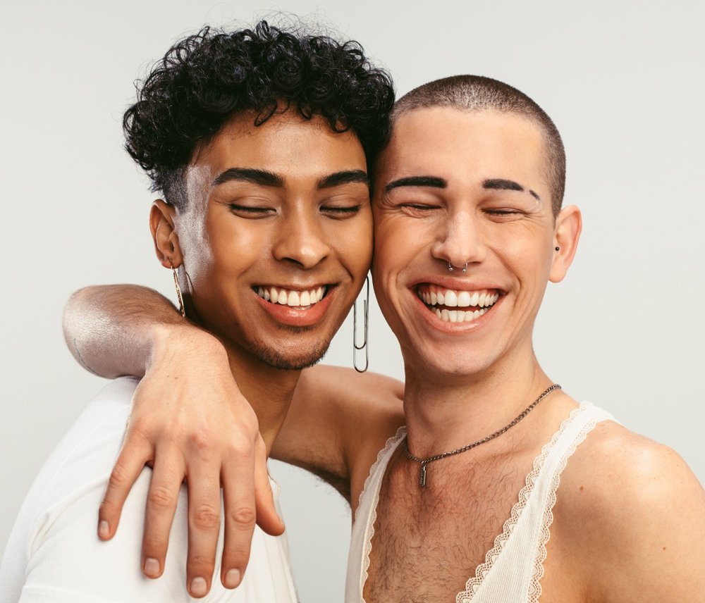 Two friends laughing together